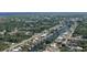 Scenic aerial view of a neighborhood with canals and waterfront homes, some with private docks at 3246 Yukon Dr, Port Charlotte, FL 33948