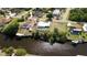 Aerial view of backyard dock and waterfront access at 3246 Yukon Dr, Port Charlotte, FL 33948