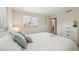 Bedroom featuring neutral tones and a view to the hallway at 3246 Yukon Dr, Port Charlotte, FL 33948