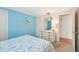Coastal bedroom with light blue walls and nautical decor at 3246 Yukon Dr, Port Charlotte, FL 33948