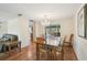 Charming dining area with hardwood floors and a crystal chandelier at 3246 Yukon Dr, Port Charlotte, FL 33948