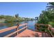 Wooden dock overlooking the waterway with boat lift potential at 3246 Yukon Dr, Port Charlotte, FL 33948