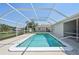 This backyard pool is screened in for the comfort and enjoyment of the residents at 3246 Yukon Dr, Port Charlotte, FL 33948