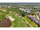Beautiful golf course community with lush landscaping, lakes, and winding roads near single Gathering homes at 3433 Grand Vista Ct # 102, Port Charlotte, FL 33953