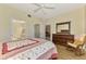 Spacious bedroom with a large dresser, cozy chair, and access to a bathroom and closet providing ample storage and relaxation at 3433 Grand Vista Ct # 102, Port Charlotte, FL 33953