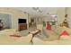 Spacious living area featuring a television and ample seating at 3433 Grand Vista Ct # 102, Port Charlotte, FL 33953