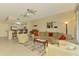 Inviting living area with views into the kitchen and dining spaces at 3433 Grand Vista Ct # 102, Port Charlotte, FL 33953