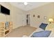 Cozy living room with a comfortable sofa and a mounted TV creating a relaxing and enjoyable space at 3433 Grand Vista Ct # 102, Port Charlotte, FL 33953