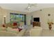 Bright living room with a screen lanai and a relaxing atmosphere at 3433 Grand Vista Ct # 102, Port Charlotte, FL 33953