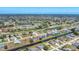 Wide aerial view of the community showcasing homes and waterways at 39 Fairway Rd, Rotonda West, FL 33947