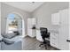 Bright home office features built-in storage, desk, and a large window for natural light at 39 Fairway Rd, Rotonda West, FL 33947
