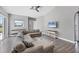 Spacious living room with vaulted ceiling, comfortable seating and lots of natural light at 39 Fairway Rd, Rotonda West, FL 33947
