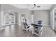 Spacious living area with stylish decor, high ceilings, and seamless flow to other rooms for easy entertaining at 39 Fairway Rd, Rotonda West, FL 33947