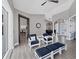 Elegant living room with neutral walls, stylish furnishings, and seamless access to the dining and kitchen areas at 39 Fairway Rd, Rotonda West, FL 33947