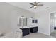 Large main bathroom features a double sink vanity with a separate tub and access to the bedroom at 39 Fairway Rd, Rotonda West, FL 33947