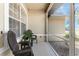 Inviting screened-in patio featuring comfortable seating and a pleasant outdoor ambiance, perfect for relaxing and enjoying the weather at 4 Pine Valley Ln, Rotonda West, FL 33947