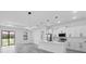 Open concept kitchen featuring an island, stainless steel appliances, and sleek cabinetry at 40 Golfview Ct, Rotonda West, FL 33947