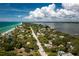 Beautiful aerial view of the coastline and neighborhood, showcasing the community at 4065 N Beach Rd # A, Englewood, FL 34223