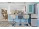 The kitchen bar features seating and stainless appliances at 4065 N Beach Rd # A, Englewood, FL 34223