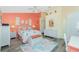 This bedroom features a coastal theme, a comfortable bed, and stylish wicker furniture at 4207 Fairway Pl, North Port, FL 34287