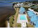 Beautiful waterfront condominiums offer community pool, beach access, and recreational facilities at 4410 Warren Ave # 104, Port Charlotte, FL 33953