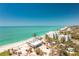 Drone image of a beach community nestled along the coast, near the ocean at 5030 N Beach Rd # 1, Englewood, FL 34223