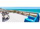 Expansive beach deck with seating provides an ideal spot to enjoy the serene ocean backdrop at 5030 N Beach Rd # 1, Englewood, FL 34223