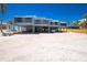 Beautiful two-story home on stilts with ample parking and beach access at 5030 N Beach Rd # 1, Englewood, FL 34223
