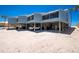 Beautiful two-story home on stilts with ample parking and beach access at 5030 N Beach Rd # 1, Englewood, FL 34223