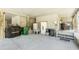Ground level of home with open covered space for parking and exterior storage along the back wall at 5030 N Beach Rd # 1, Englewood, FL 34223