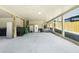 Spacious ground level with covered parking, storage, and exterior staircase to the main floor at 5030 N Beach Rd # 1, Englewood, FL 34223