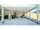 Large parking area under the home with storage at 5030 N Beach Rd # 1, Englewood, FL 34223
