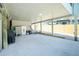 Large parking area under the home with storage at 5030 N Beach Rd # 1, Englewood, FL 34223