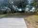 Spacious backyard featuring a new patio with a lovely lawn space at 5417 Postma St, North Port, FL 34287