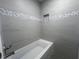 Bathroom featuring tub and custom tile work at 5417 Postma St, North Port, FL 34287