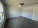 Bedroom with new floors, ceiling fan and lots of natural light at 5417 Postma St, North Port, FL 34287