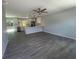 Open floor plan showcasing the seamless flow between the living room and renovated kitchen at 5417 Postma St, North Port, FL 34287