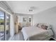 This bedroom has lots of natural light and great decor at 56 Long Meadow Ct, Rotonda West, FL 33947