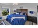 Well decorated bedroom with a large window at 56 Long Meadow Ct, Rotonda West, FL 33947