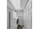 Functional laundry room with modern washer/dryer, ample cabinet space, and stylish lighting at 56 Long Meadow Ct, Rotonda West, FL 33947