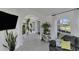 Stylish living room showcasing tiled floors, modern accents, and lots of natural light at 56 Long Meadow Ct, Rotonda West, FL 33947