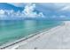 Breathtaking aerial view of the coastline, showcasing the turquoise waters and sandy beach at 5700 Gulf Shores Dr # A312, Boca Grande, FL 33921