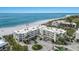 Beautiful beach front condo with tropical landscaping, ocean views, and circular driveway at 5700 Gulf Shores Dr # A312, Boca Grande, FL 33921