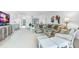 Inviting living room featuring a cozy seating area with views of the ocean at 5700 Gulf Shores Dr # A312, Boca Grande, FL 33921