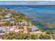 Gorgeous aerial view highlighting the waterfront neighborhood with a stunning waterfront view at 6029 Manasota Key Rd, Englewood, FL 34223