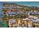 Aerial view of the neighborhood, highlighting the property's waterfront access and nearby amenities at 6029 Manasota Key Rd, Englewood, FL 34223