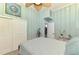 Cozy bedroom with neutral tones, closet, and a serene, relaxing ambiance at 6029 Manasota Key Rd, Englewood, FL 34223