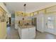 Modern kitchen features granite countertops, stainless steel appliances, and an open layout at 6029 Manasota Key Rd, Englewood, FL 34223