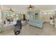 Bright living area showcasing open layout with water view and comfortable furnishings at 6029 Manasota Key Rd, Englewood, FL 34223