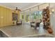 Bright sunroom with tile floors, comfortable seating, and view of the backyard at 6029 Manasota Key Rd, Englewood, FL 34223